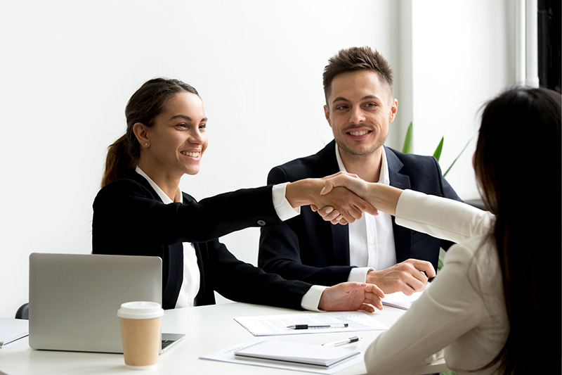 A manager providing performance feedback to an employee during an appraisal